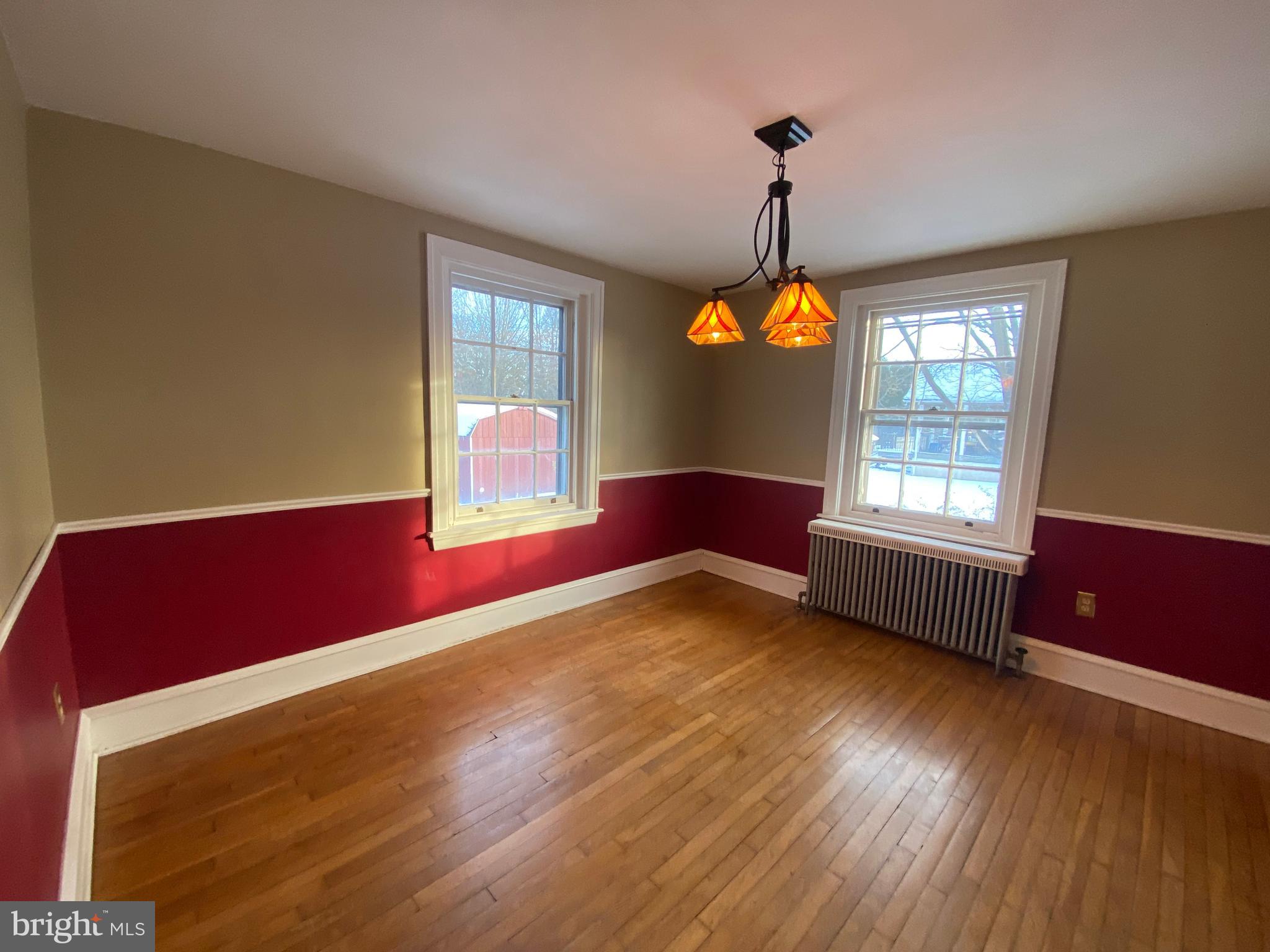 2012 Old Forty Foot Road Harleysville, PA 19438 - Photo 4 of 36 a view of an empty room with window and wooden floor
