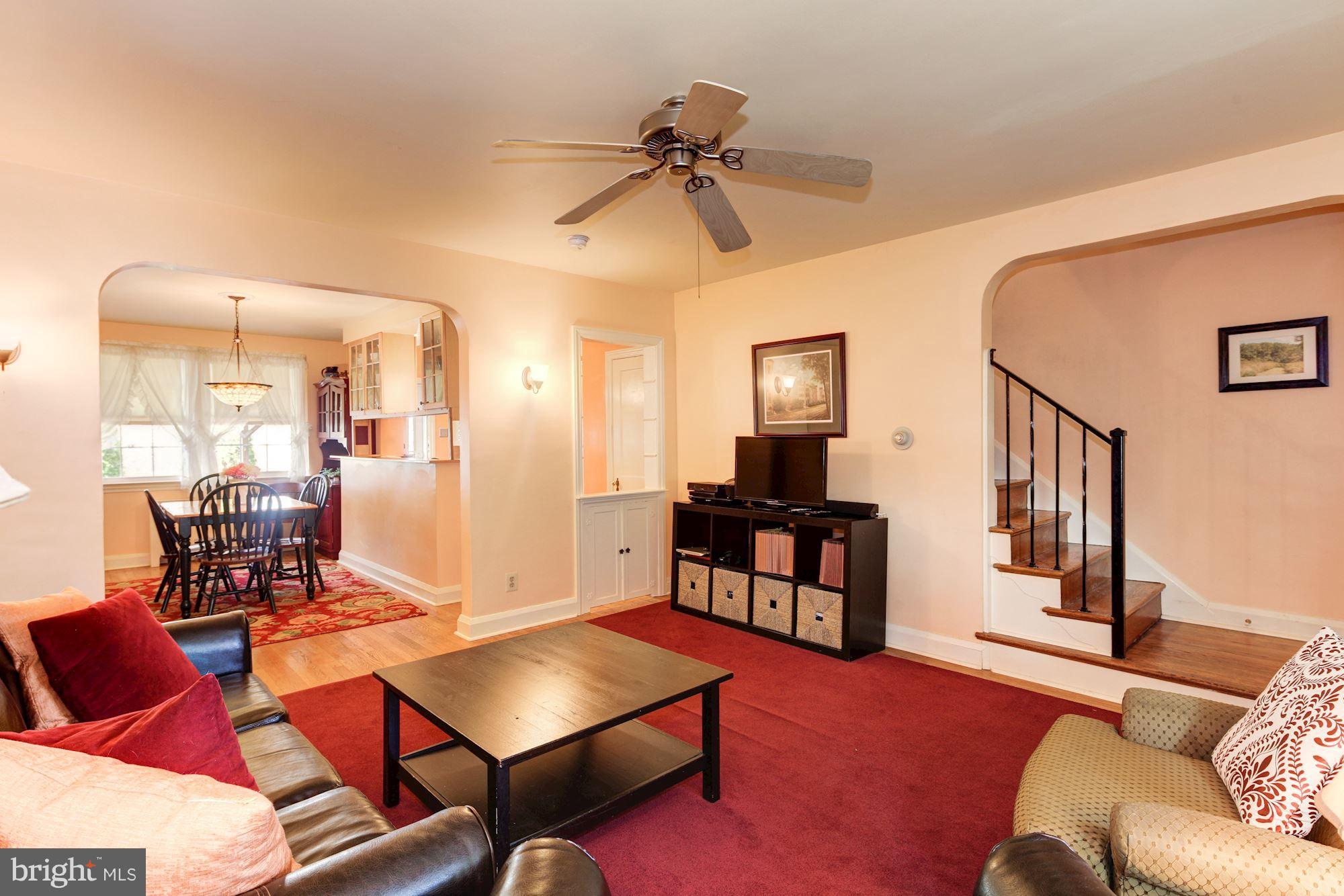 222 Ridge Avenue Baltimore, MD 21286 - Photo 6 of 30 a living room with furniture and a table