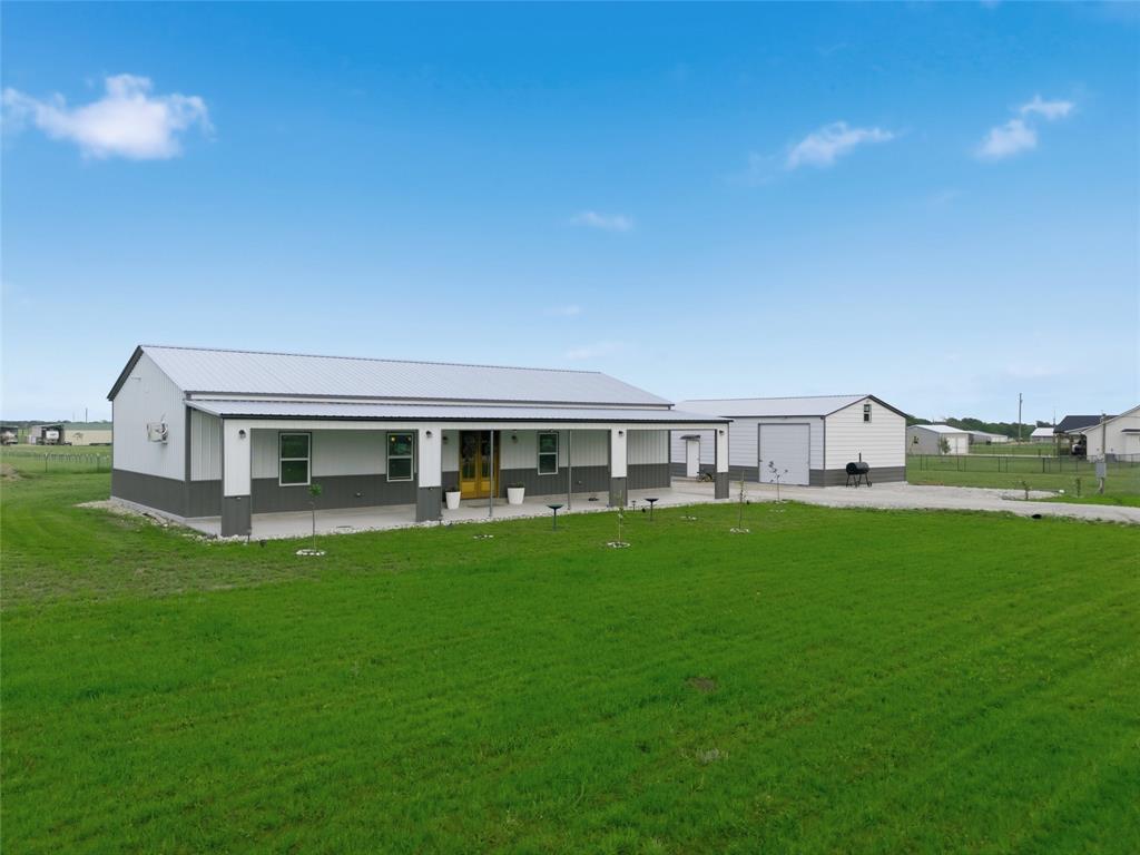 151 Kasberg Road Leroy, TX 76691 - Photo 35 of 40 a front view of house with yard and seating area