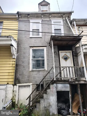 a view of house with front door