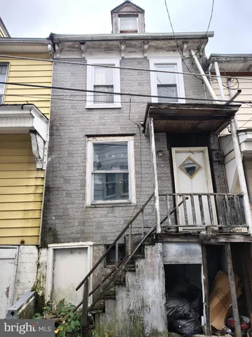 a view of house with front door
