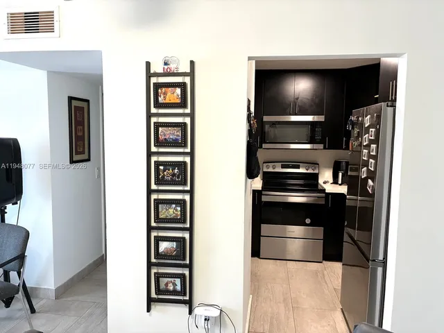 a view of kitchen and microwave