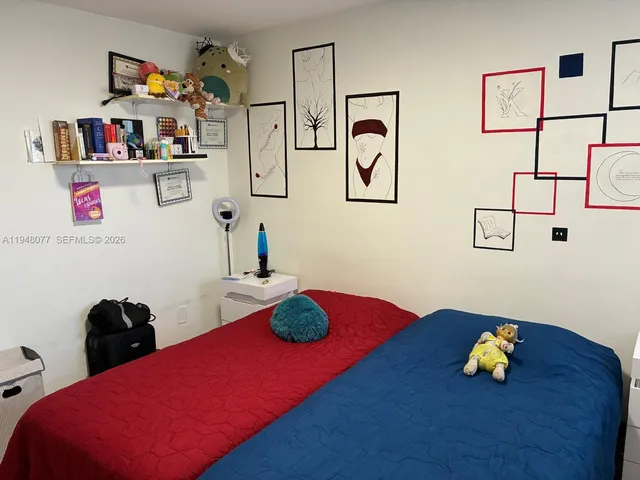 a room with toys and wooden floor