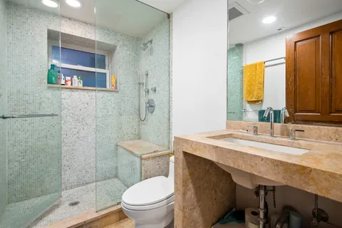 a bathroom with a toilet a sink and a bathtub