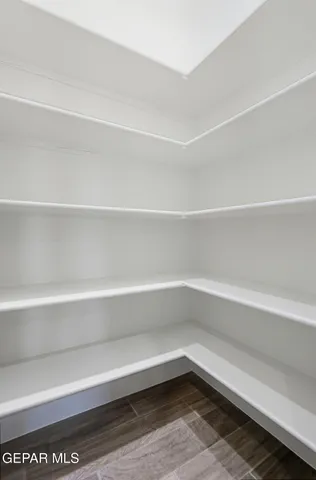 a view of a room with rack on the wall