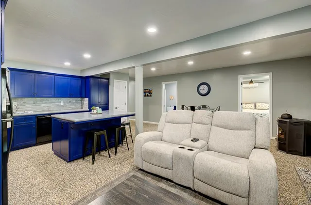 a bathroom with double vanity sinks and a mirror