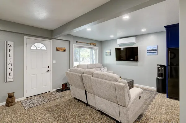a kitchen with a stove a sink and a refrigerator