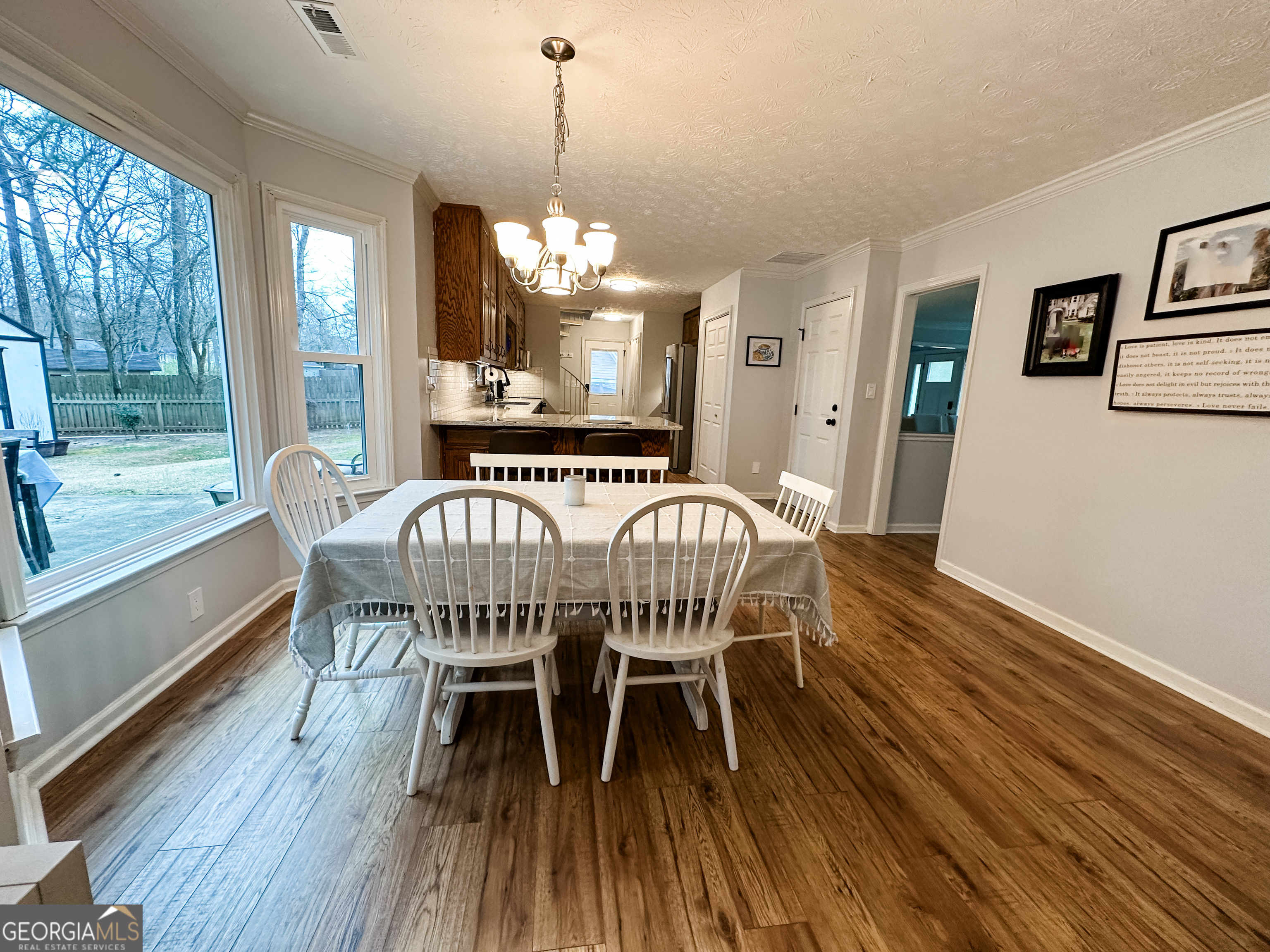502 Richey Place Peachtree City, GA 30269 - Photo 18 of 61 a view of a dining room with furniture window and wooden floor