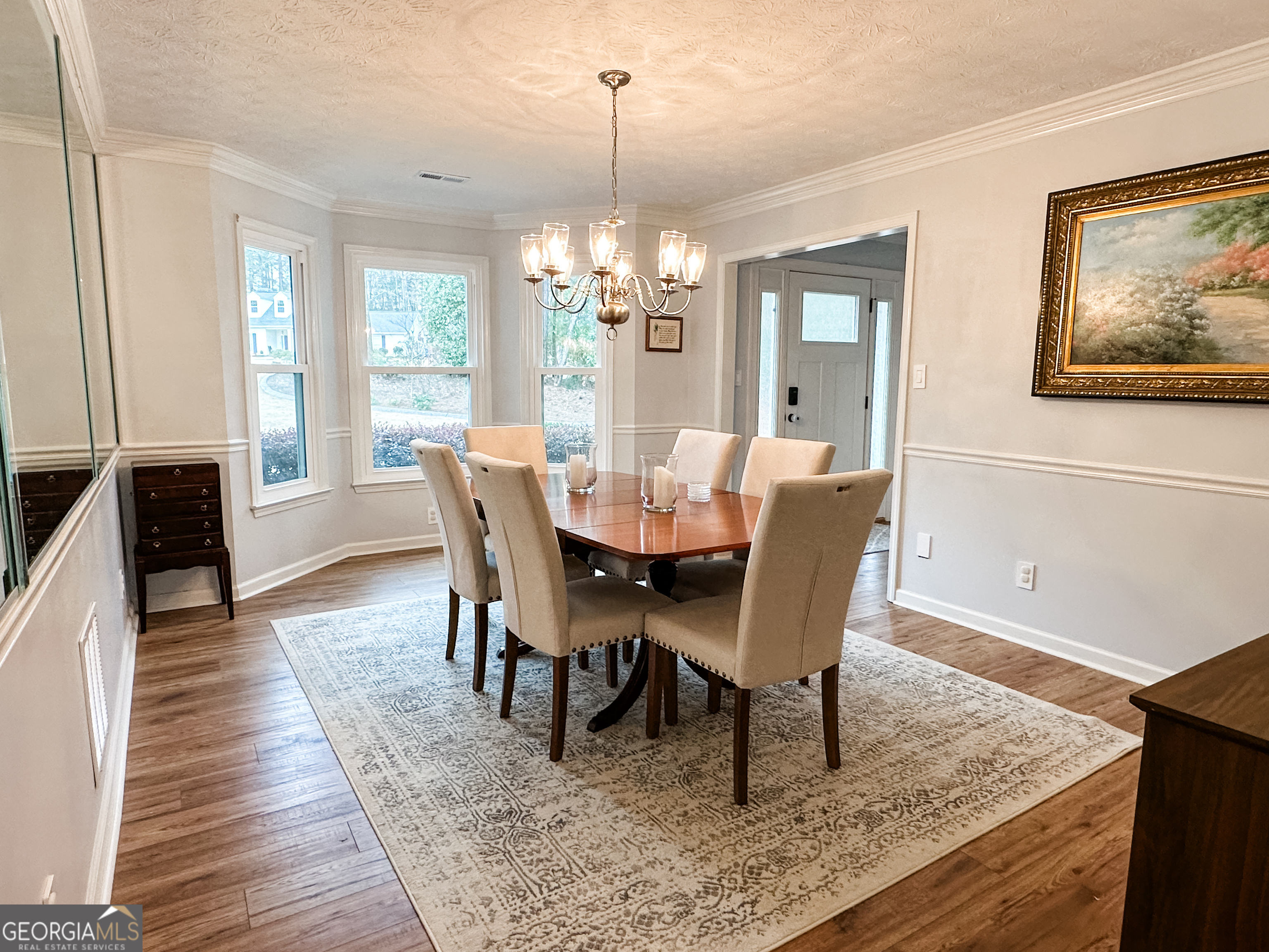 502 Richey Place Peachtree City, GA 30269 - Photo 4 of 61 a view of a dining room with furniture window and wooden floor