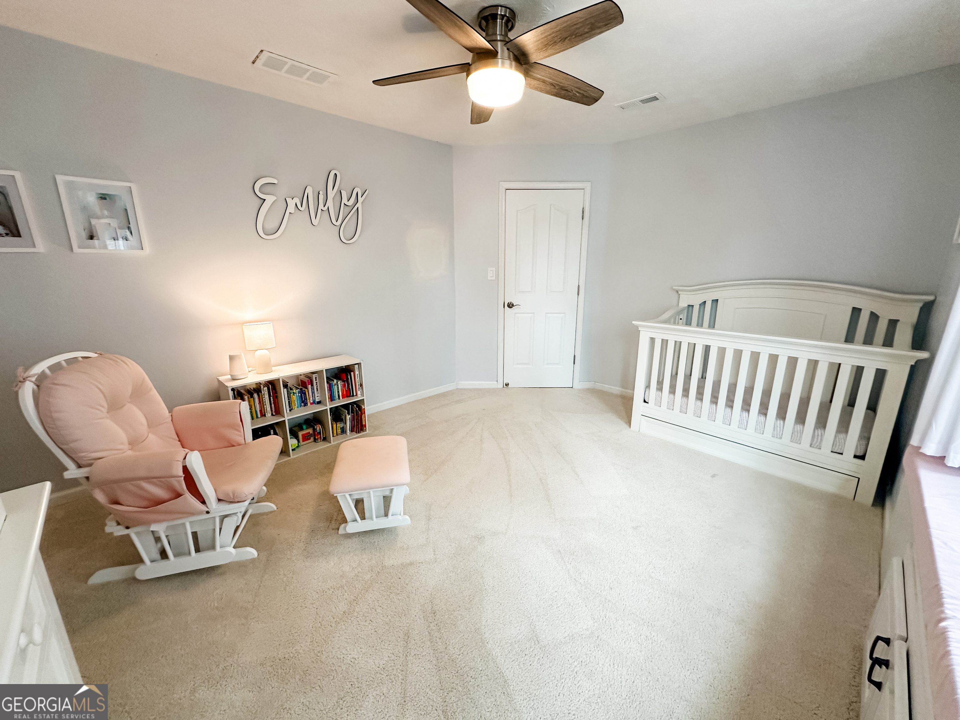 502 Richey Place Peachtree City, GA 30269 - Photo 44 of 61 a bedroom with furniture and ceiling fan