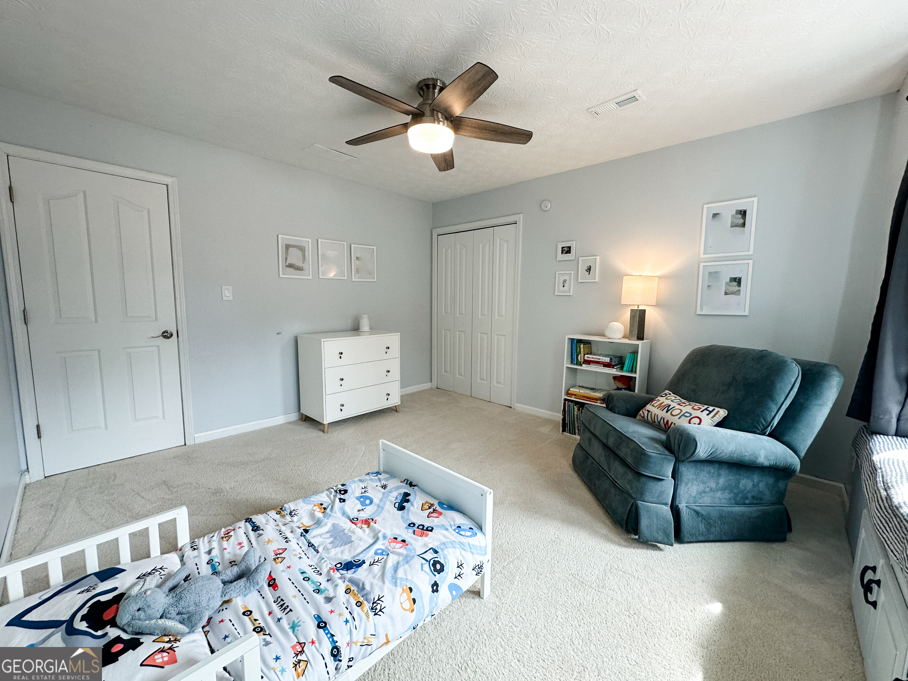 502 Richey Place Peachtree City, GA 30269 - Photo 46 of 61 a living room with furniture and ceiling fan