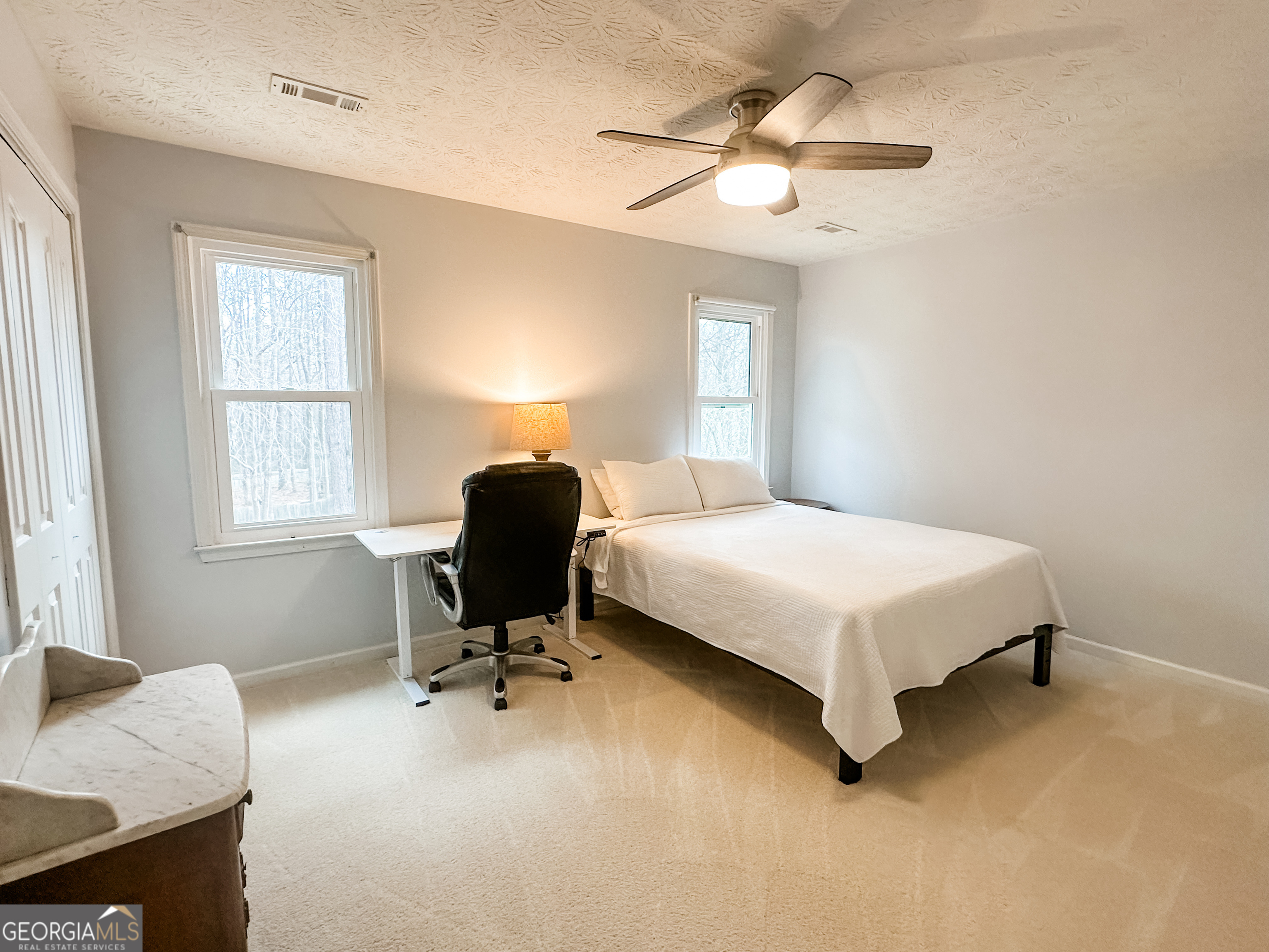 502 Richey Place Peachtree City, GA 30269 - Photo 51 of 61 a bedroom with a bed and a window