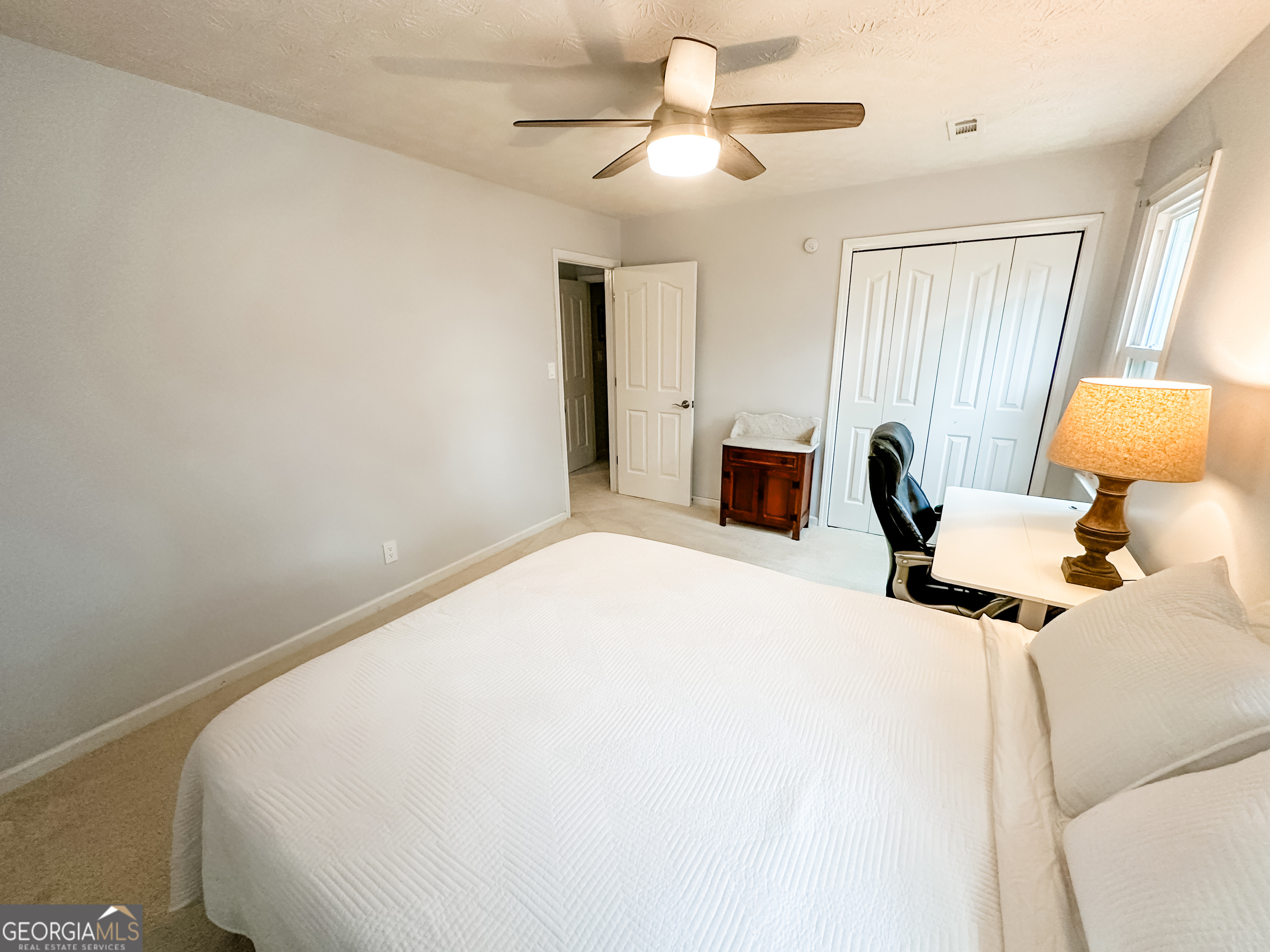 502 Richey Place Peachtree City, GA 30269 - Photo 53 of 61 a bedroom with a bed and window