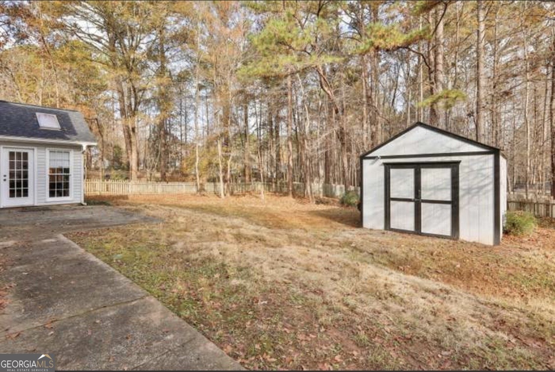 502 Richey Place Peachtree City, GA 30269 - Photo 55 of 61 a front view of a house with a yard