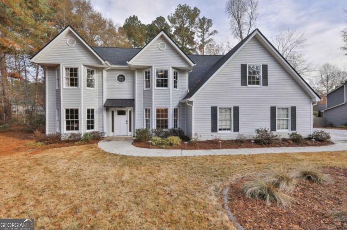 502 Richey Place Peachtree City, GA 30269 - Photo 61 of 61 a front view of a house with a yard