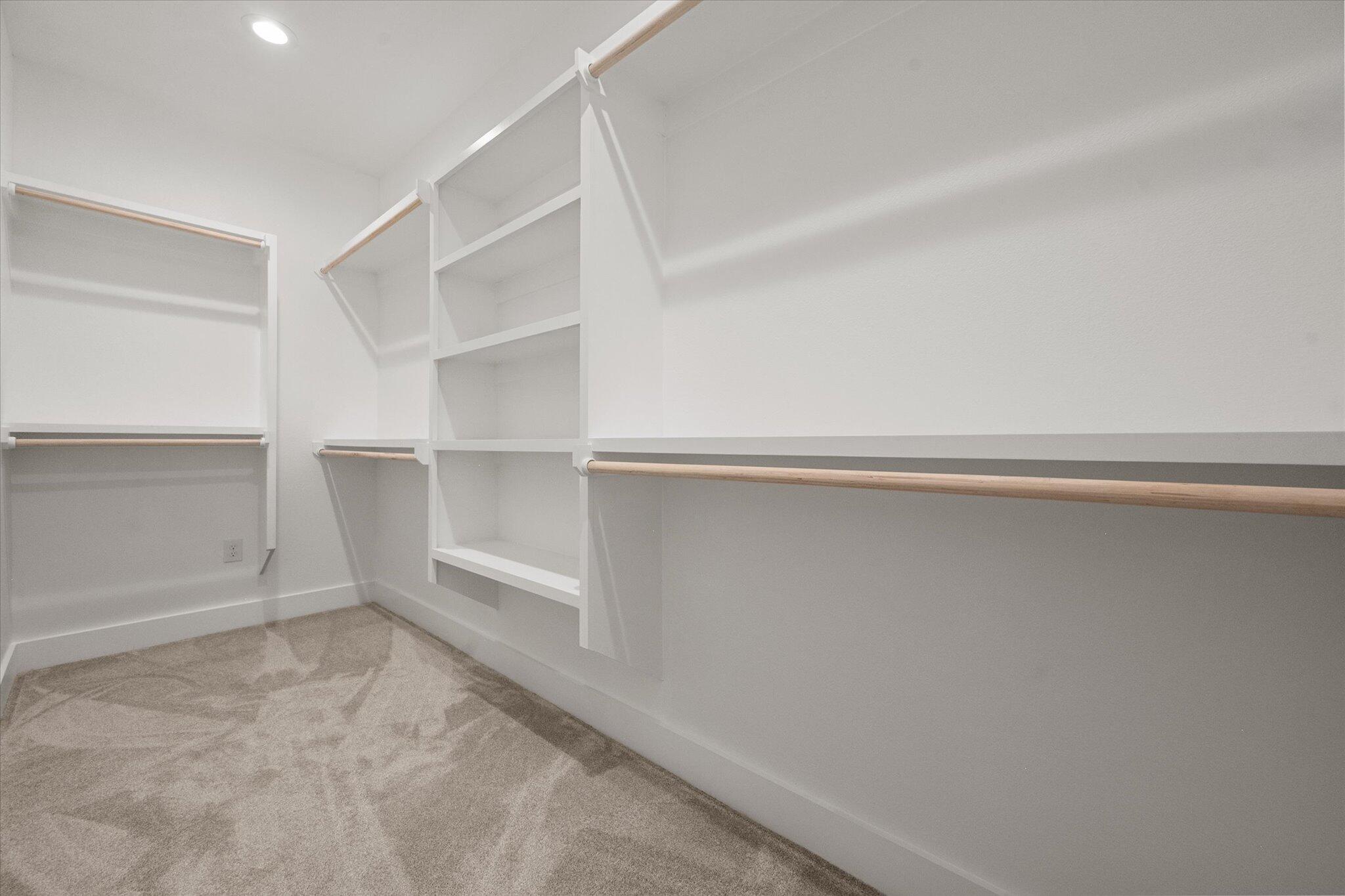 1404 Durham Avenue Wolfforth, TX 79382 - Photo 31 of 34 a view of an empty walk in closet