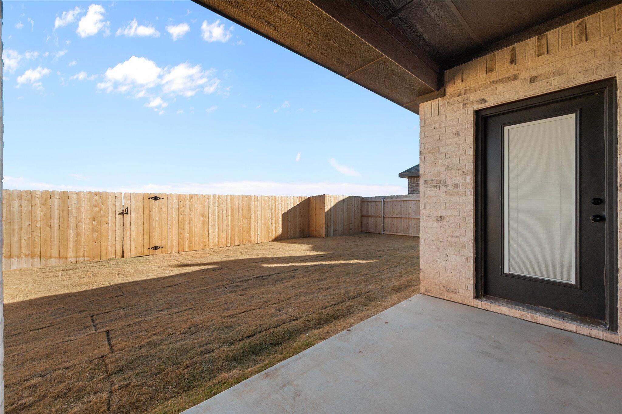 1404 Durham Avenue Wolfforth, TX 79382 - Photo 32 of 34 a view of a terrace