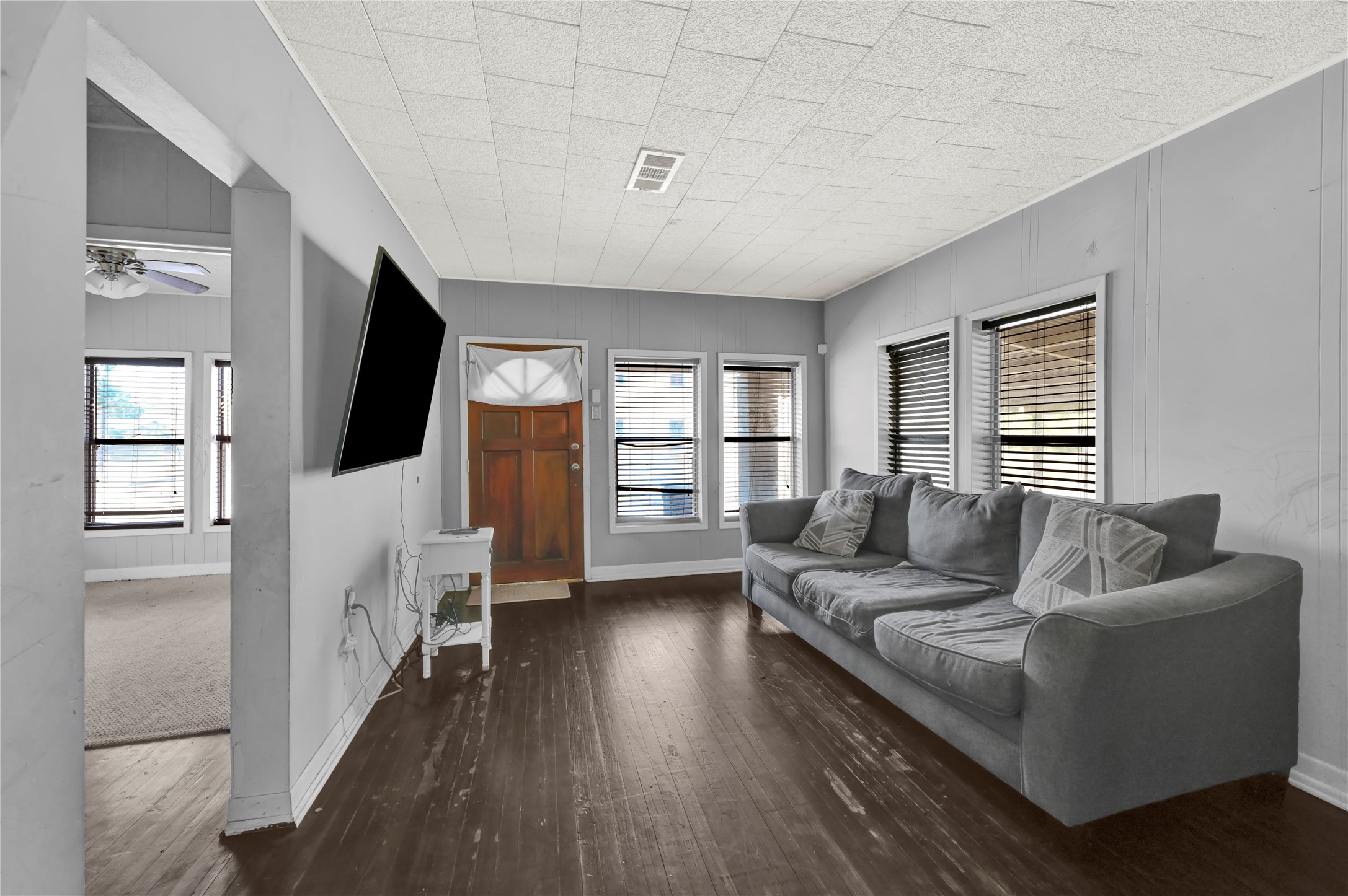 720 Yupon Street Baytown, TX 77520 - Photo 5 of 15 a living room with furniture and a flat screen tv