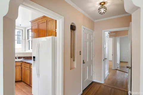 a view of a balcony with a potted plant