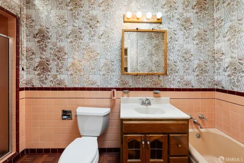 a view of a house with a tree