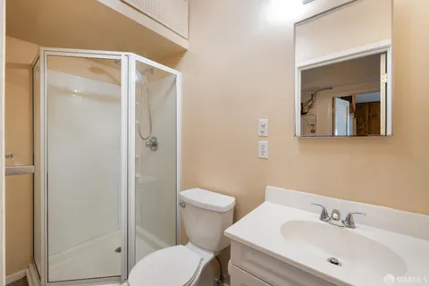 a view of a cafe with retail shops