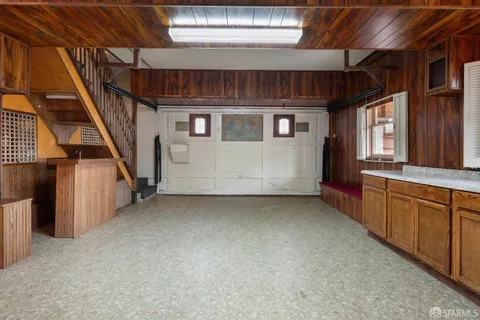 a view of a swimming pool with a lounge chair