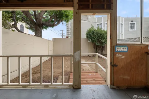a view of a street with cars park