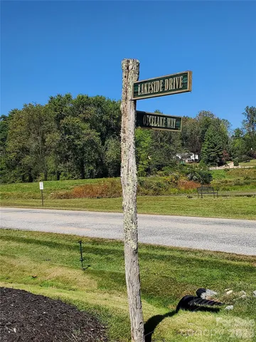 a view of a park with an ocean view