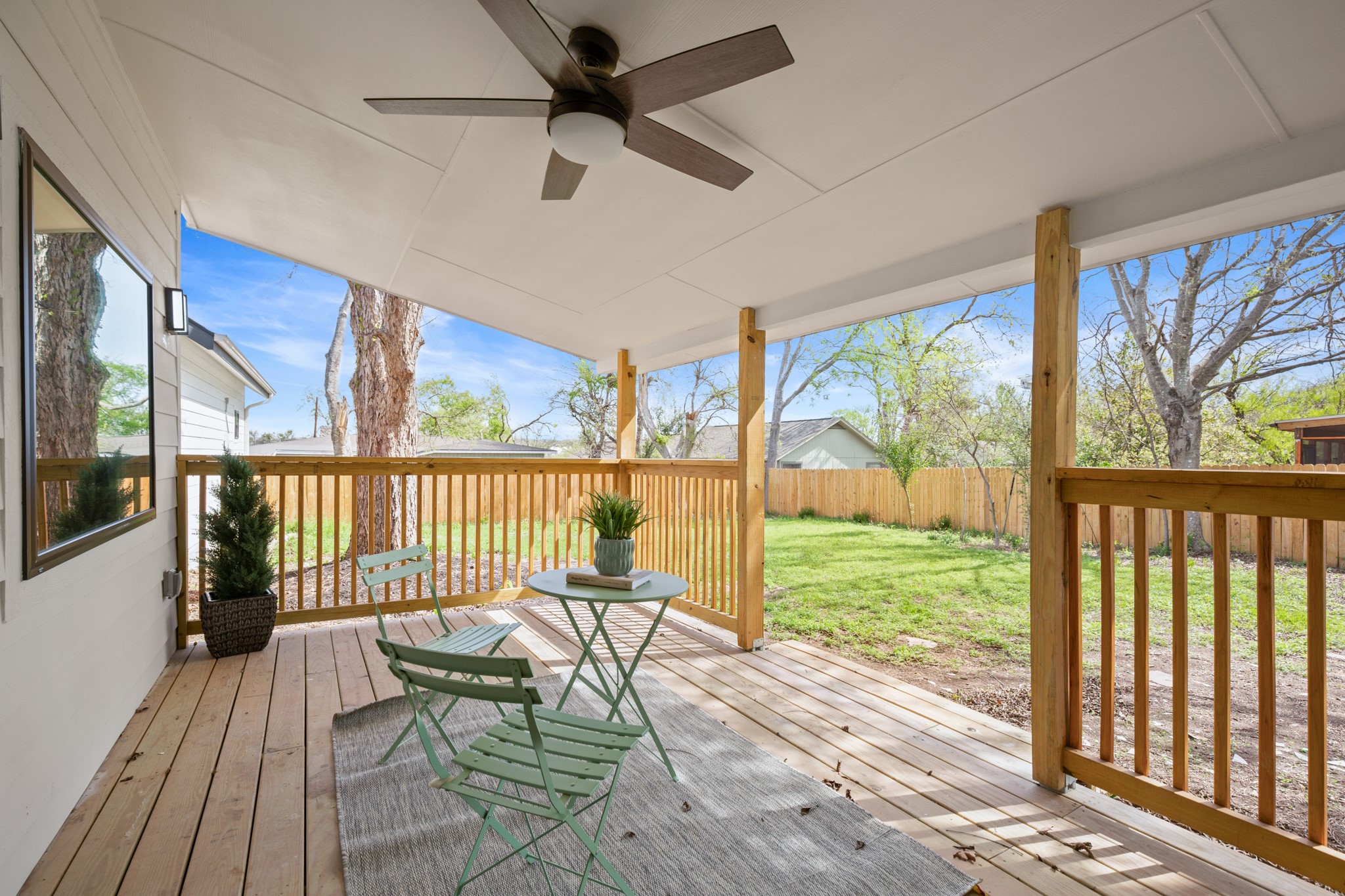 3308 Touchstone Street Austin, TX 78723 - Photo 34 of 38 Deck with a fenced backyard and a ceiling fan