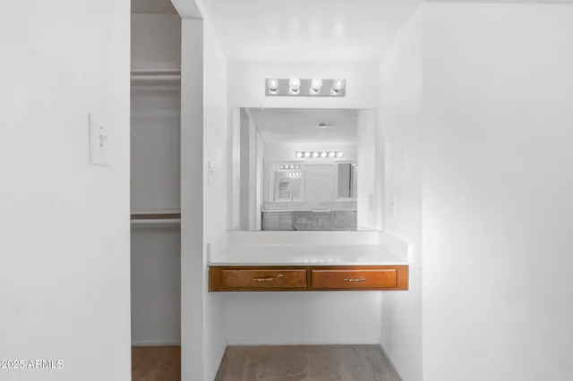 a bathroom with a bathtub and a sink