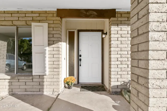 a front view of a house with a outdoor space