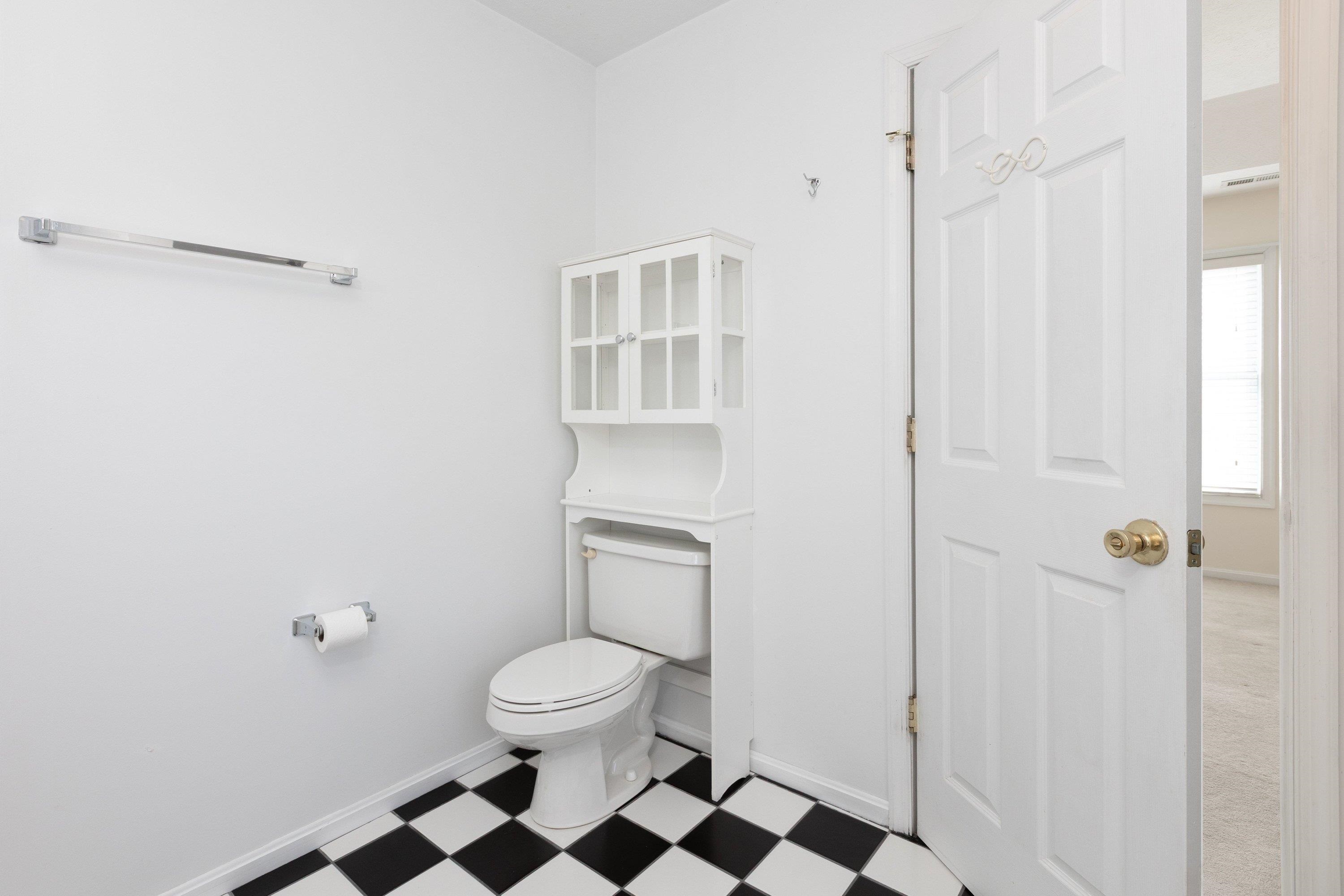 536 Three Leagues Road McGaheysville, VA 22840 - Photo 25 of 71 a white toilet sitting next to a bathroom sink