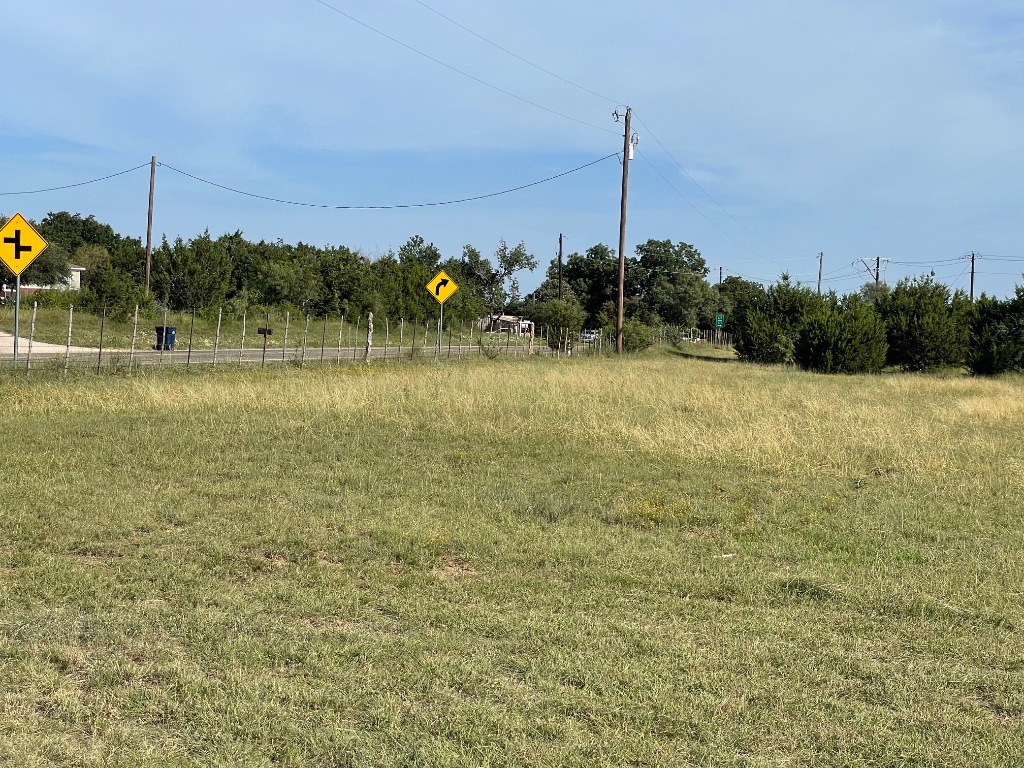 1412 South Fm 1174 Road Bertram, TX 78605 - Photo 23 of 23 a view of a lake with a big yard