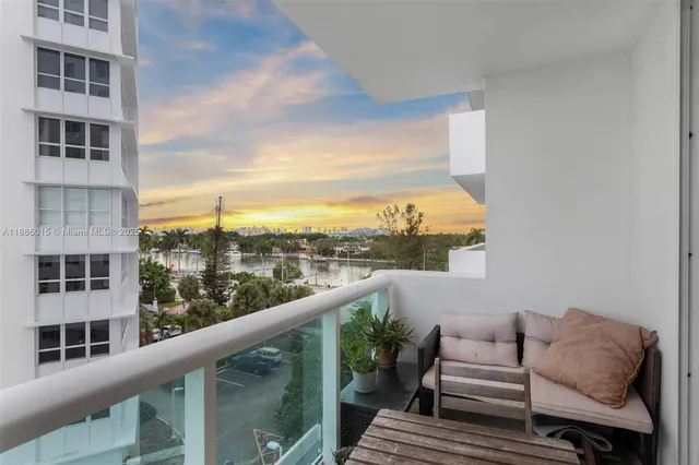 a view of balcony with furniture
