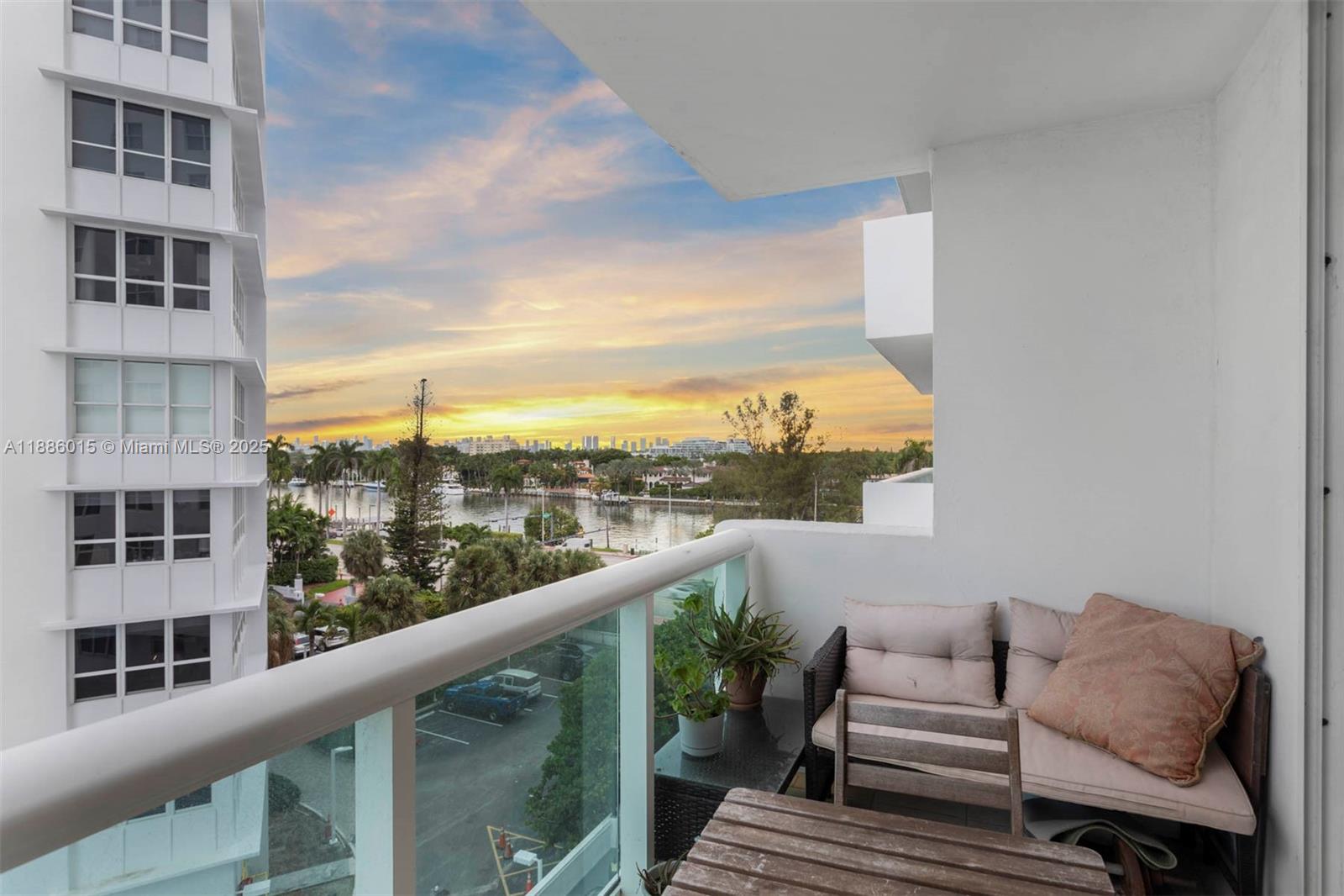 5001 Collins Avenue, Unit 5E Miami Beach, FL 33140 - Photo 1 of 17 a view of balcony with furniture