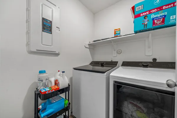 a utility room with dryer and washer