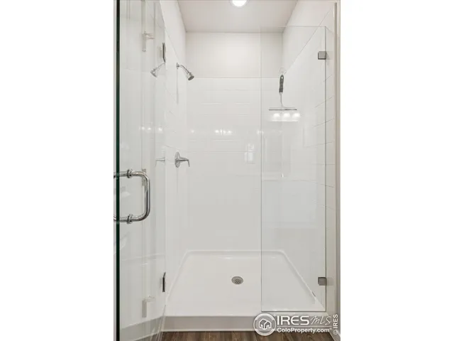 a picture of a bench in front of a building