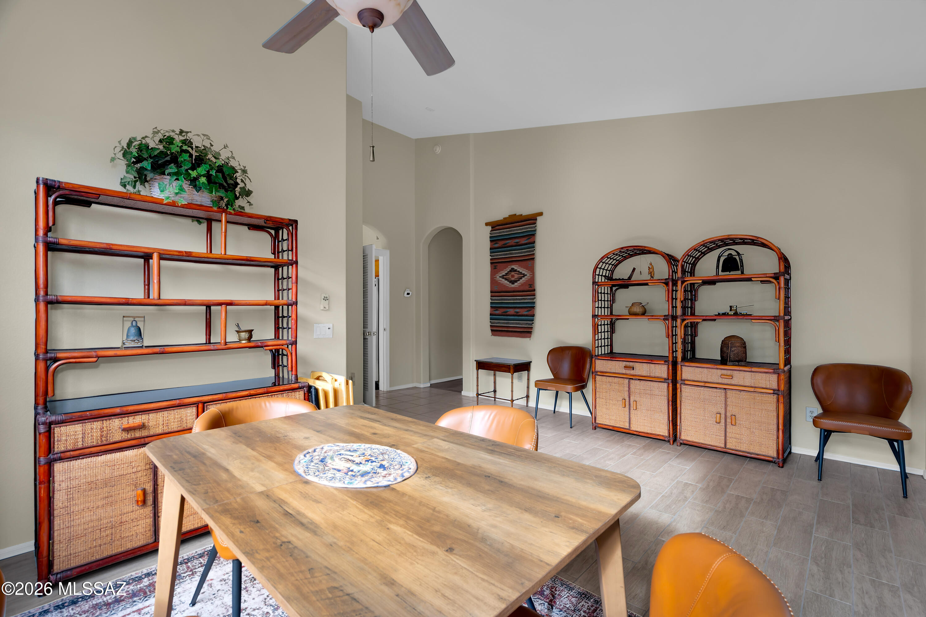 64351 East Wind Ridge Circle Tucson, AZ 85739 - Photo 7 of 41 a dining room with a table and chairs