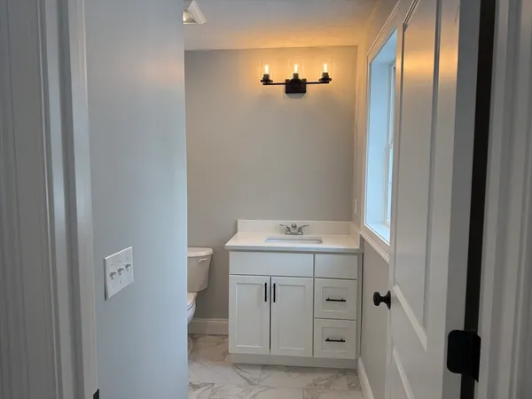 a view of cabinets with wooden floor
