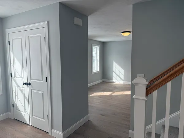 a view of entryway with wooden floor