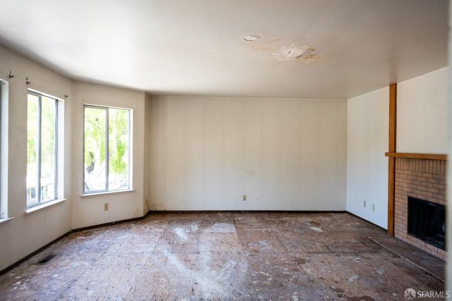 an empty room with windows