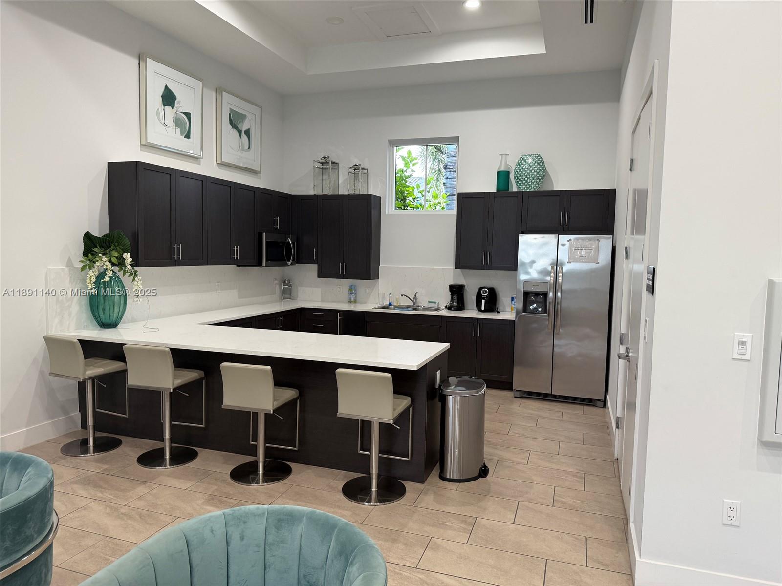 1021 Southeast 27th Street, Unit 1021 Homestead, FL 33035 - Photo 25 of 26 Community Kitchen Clubhouse