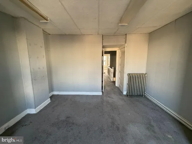 a bathroom with a toilet a sink and a bathtub