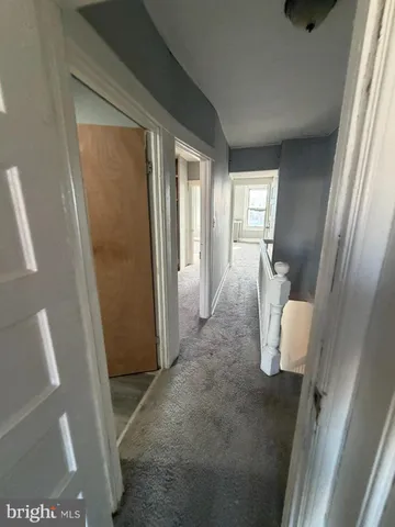 a bathroom with a toilet sink and shower