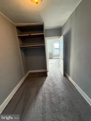 a view of empty room with a window