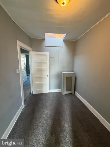 an empty room with a natural light