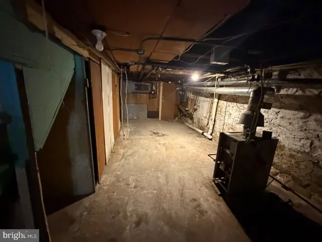 a view of a room with wooden walls