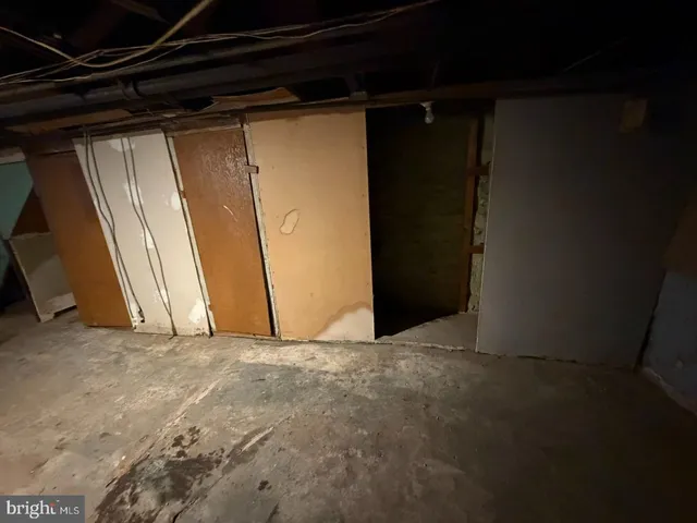 a view of a kitchen with a sink and a stove top oven