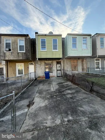 a outdoor view of a building with sitting area