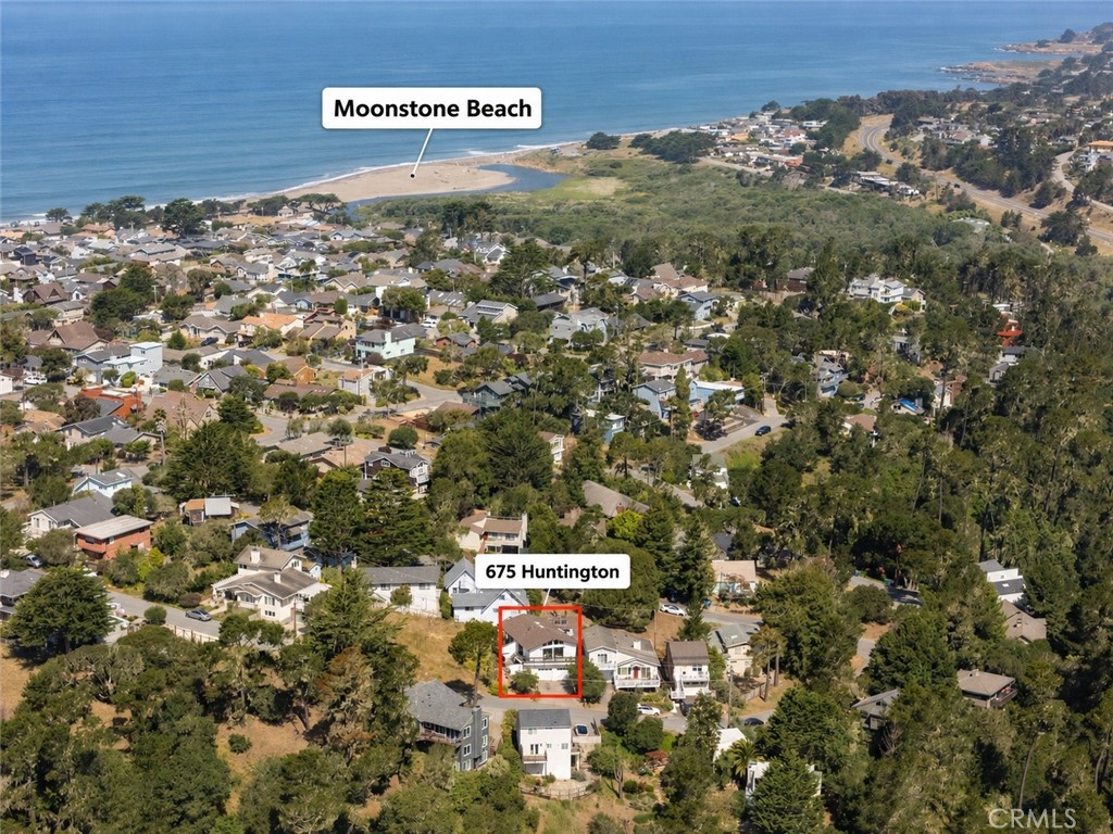 675 Huntington Road Cambria, CA 93428 - Photo 3 of 30 a view of a dry yard with wooden fence